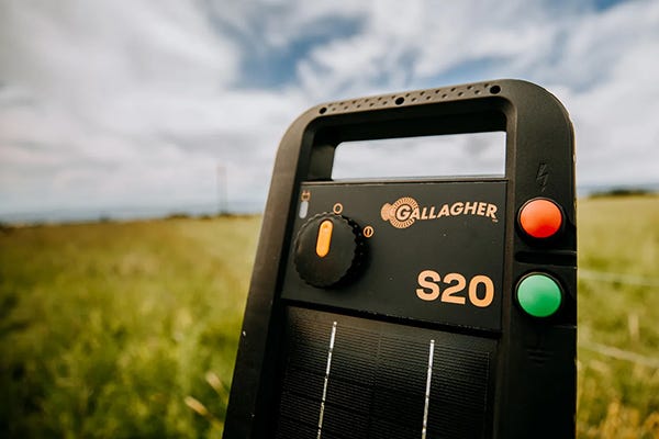 A Gallagher s20 energizer on a post in a field