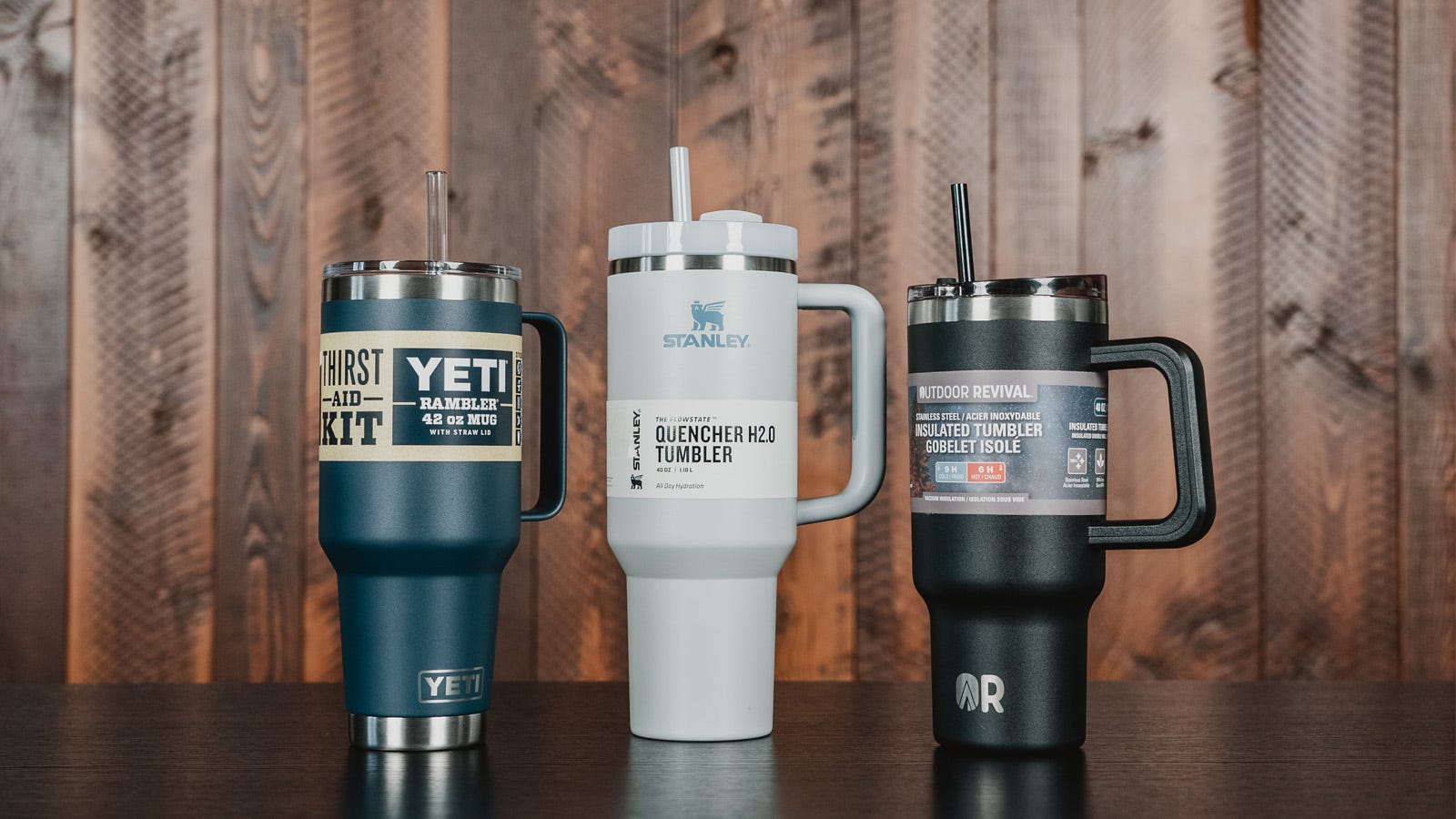 A Yeti Rambler, a Stanley Quencher, and the Outdoor Revival Tumbler sitting next to each other