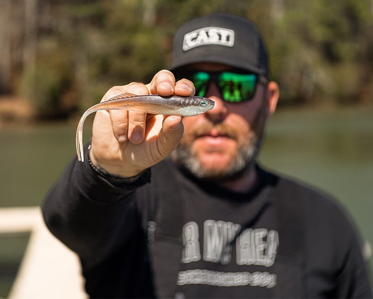 cast fishing co holding up the echo 7.2 