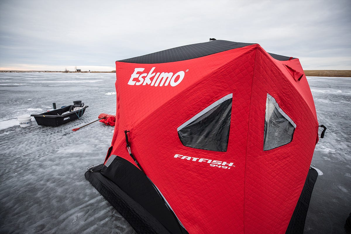 A red Eskimo ice shelter out on a lake