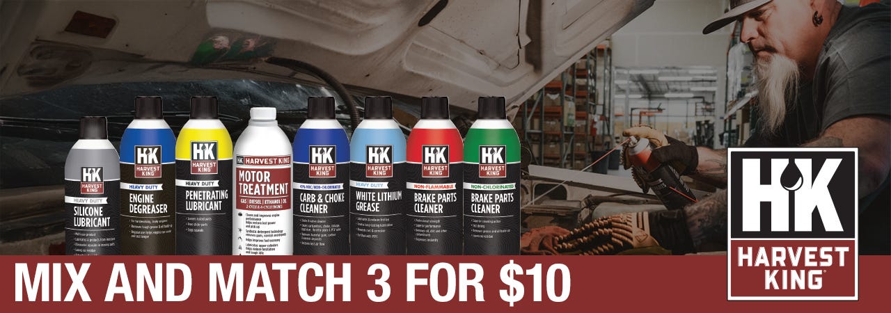 Advertisement for Harvest King automotive products with nine cans displayed. Man works on a car engine in a garage. Text: 'Mix and Match 3 for $10.' Harvest King logo on the right. The setting conveys a practical, hands-on vibe.