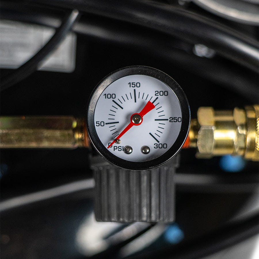 Air pressure gauge on black diamond air compressor
