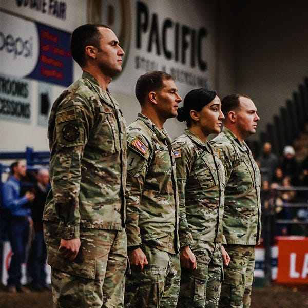 Members of the military standing at attention