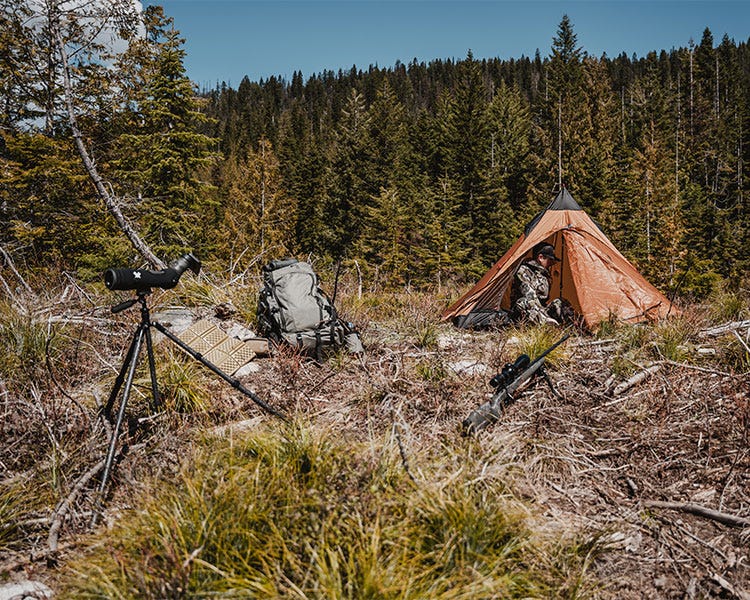 Spring Bear camp with Smith + Rogue tent, stone glacier backpack, seekins precision rifle and vortex binoculars and spotting scope 