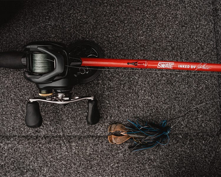 swate rod with shimano curado reel, black and blue jig with a craw trailer 