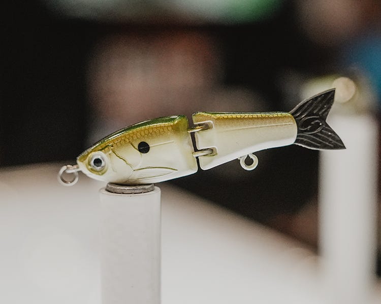 the new bitsy glide bait on display at the icast 2026 booth by strike king