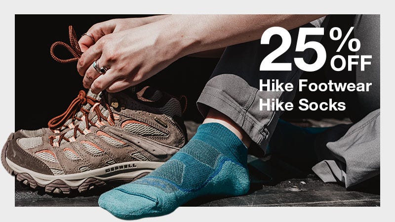 Trying on Hiking Shoes with 25% Off Hike Footwear and Hike Socks Overlaid