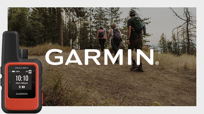 Three hikers with backpacks walk up a dirt trail through a forest, with a large "GARMIN" logo overlaid; in the foreground, a red Garmin inReach MINI 2 device is displayed.