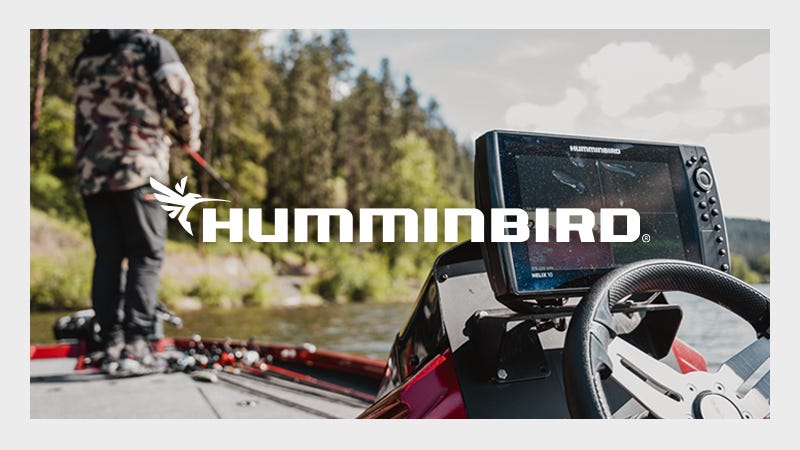 Humminbird Fish Finder on Boat with Man Fishing in the Background