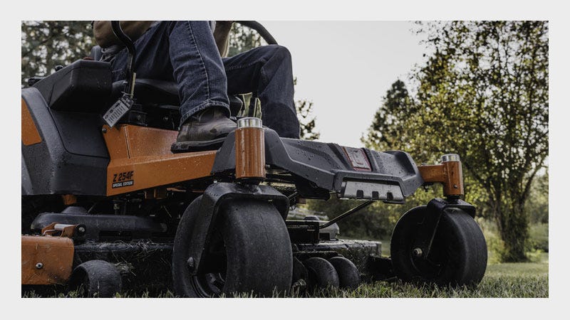 Man on Mower; Mowers sale for North 40 