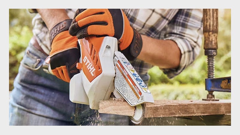 STIHL Handheld Gardening Pruners cutting through a wood board. 