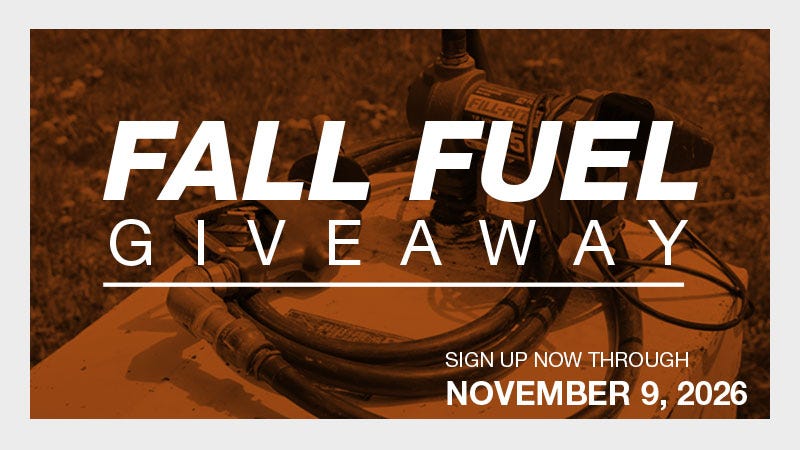 A promotional image with hoses and fuel equipment in the background, overlaid with large text reading "Fall Fuel Giveaway" and smaller text stating "Sign up now through November 9, 2026."