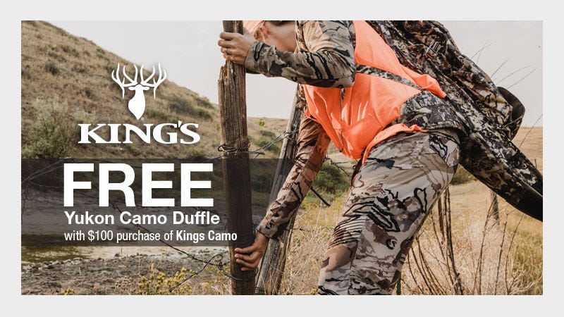 Woman pulling out fence post wearing orange vest and camo. Text reads "King's FREE Yukon Camo Duffle WIth $100 Purchase of King's Camo."