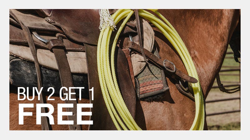 Detailed shot of bright yellow rodeo rope hanging off horse's side. Text reads "Buy 2 Get 1 Free."