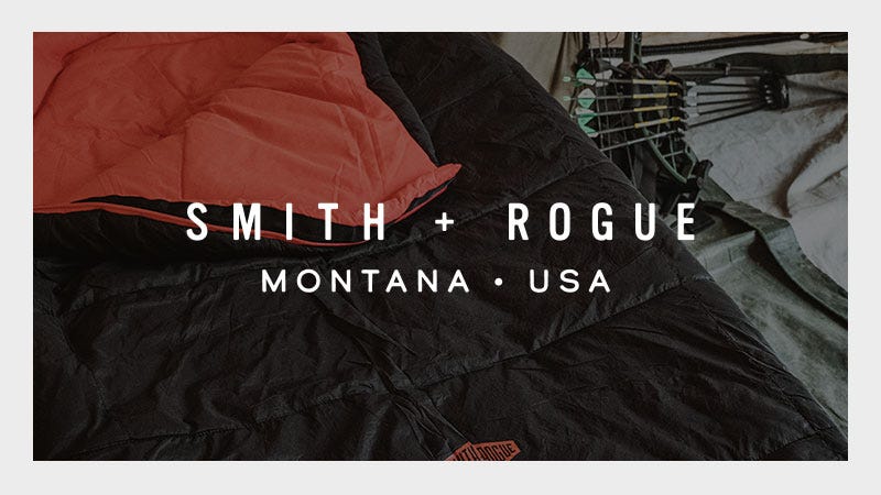 A black and red sleeping bag is laid out, with a bow and arrows in the background. Text overlay reads "Smith + Rogue, Montana, USA," suggesting outdoor adventure.