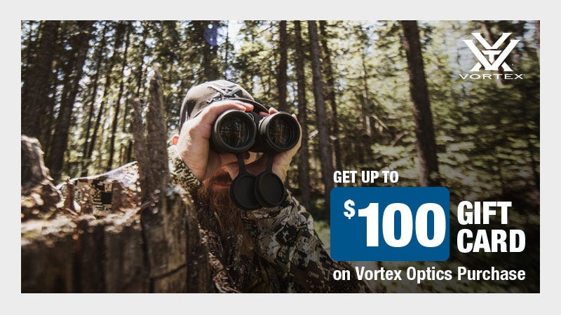Close up shot of man holding binoculars from a low angle in the woods. Text reads "$100 Gift Card on Vortex Optics Purchase."