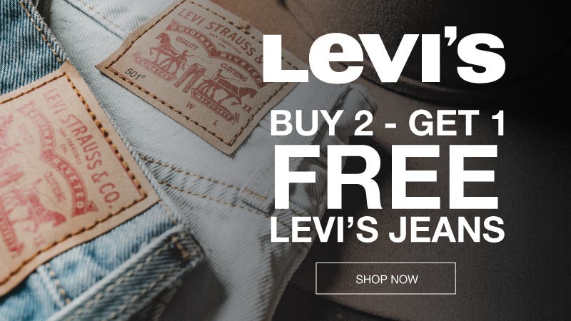 Levi's jeans on sale, featuring various styles and sizes displayed in a retail setting.