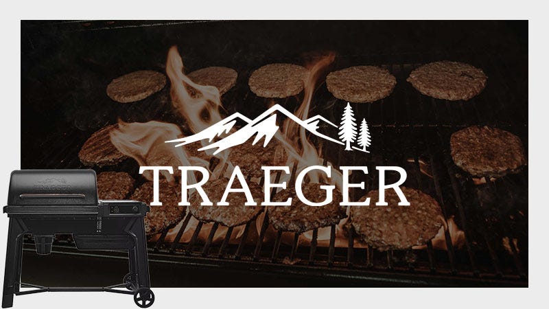 Traeger Grill with Traeger Logo and burgers being made