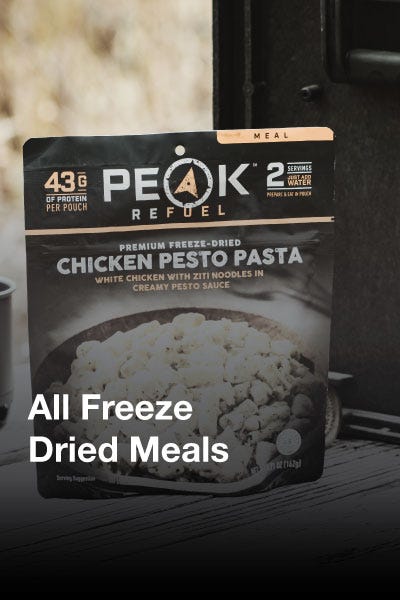 Multiple freeze-dried meal containers arranged together, emphasizing their suitability for travel and emergency preparedness.