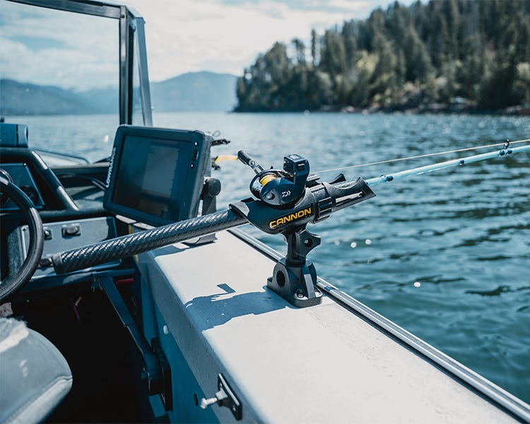 a daiwa lexa and swate fiberhammer in a cannon rod holder, on the boat and trolling lake pend oreille