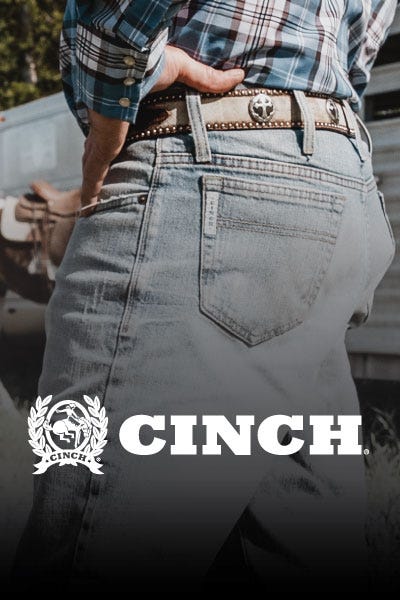 A detailed view of a cinch denim, highlighting its modern style and functionality in a minimalist setting.