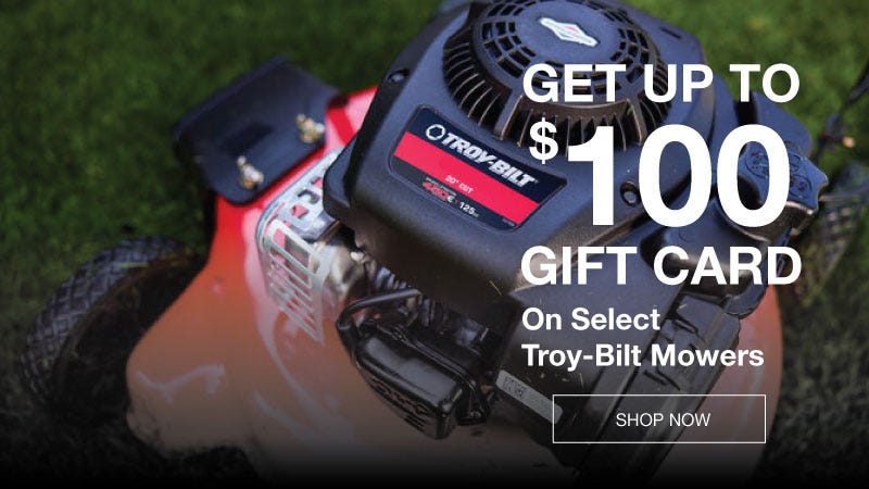  A selection of Troy-Bilt lawn mowers in a store, emphasizing their modern design and functionality for lawn care.