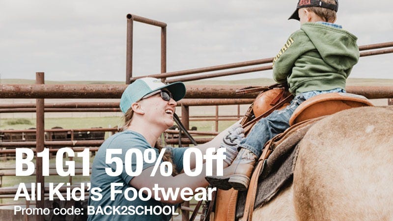 A woman helps a young child, who is sitting on a horse, while smiling at him. Large text over the image reads: "B1G1 50% Off All Kid&rsquo;s Footwear. Promo code: BACK2SCHOOL."