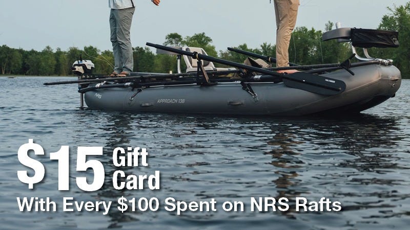 Two people stand on a raft in a calm lake, surrounded by trees. Text reads: "$15 Gift Card with Every $100 Spent on NRS Rafts."